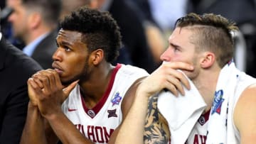 Apr 2, 2016; Houston, TX, USA; Oklahoma Sooners guard Buddy Hield (24) and forward Ryan Spangler (00) react on the bench during the second half against the Villanova Wildcats in the 2016 NCAA Men