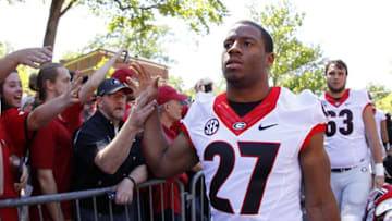 Apr 16, 2016; Athens, GA, USA; Georgia Bulldogs running back Nick Chubb (27) greets fans during the Dawg Walk before the spring game at Sanford Stadium. Mandatory Credit: Brett Davis-USA TODAY Sports