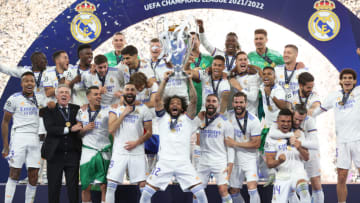 PARIS, FRANCE - MAY 28: Marcelo of Real Madrid lifts the UEFA Champions League Trophy after their sides victory in the UEFA Champions League final match between Liverpool FC and Real Madrid at Stade de France on May 28, 2022 in Paris, France. (Photo by Julian Finney/Getty Images)