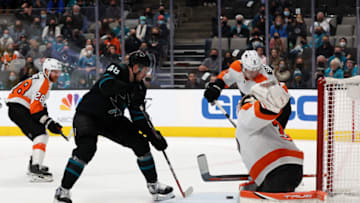 SAN JOSE, CALIFORNIA - DECEMBER 30: Tomas Hertl #48 of the San Jose Sharks scores the winning goal on Felix Sandstrom #32 of the Philadelphia Flyers in overtime at SAP Center on December 30, 2021 in San Jose, California. (Photo by Ezra Shaw/Getty Images)