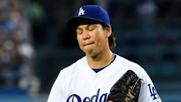 Aug 9, 2016; Los Angeles, CA, USA; Los Angeles Dodgers starting pitcher Kenta Maeda (18) walks off the field after the second inning of the game against the Philadelphia Phillies at Dodger Stadium. Mandatory Credit: Jayne Kamin-Oncea-USA TODAY Sports