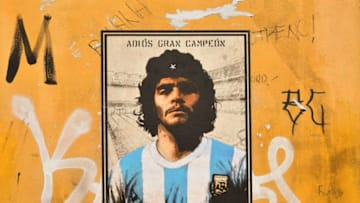 A mural dedicated to Diego Armando Maradona, (Photo by ALBERTO PIZZOLI/AFP via Getty Images)