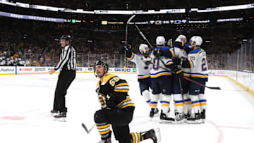 BOSTON, MASSACHUSETTS - JUNE 06: David Perron #57 of the St. Louis Blues is congratulated by his teammates after scoring a third period goal as Noel Acciari #55 of the Boston Bruins in Game Five of the 2019 NHL Stanley Cup Final at TD Garden on June 06, 2019 in Boston, Massachusetts. (Photo by Bruce Bennett/Getty Images)