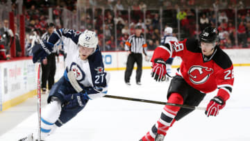 Damon Severson #28 of the New Jersey Devils (Photo by Christopher Pasatieri/Getty Images)