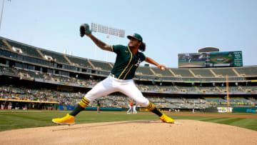 OAKLAND, CA - SEPTMEBER 25: Sean Manaea #55 of the Oakland Athletics warms up from the mound before the game against the Houston Astros at RingCentral Coliseum on September 25, 2021 in Oakland, California. The Athletics defeated the Astros 2-1. (Photo by Michael Zagaris/Oakland Athletics/Getty Images)