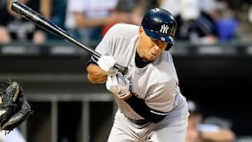 Aug 6, 2013; Chicago, IL, USA; New York Yankees third baseman Alex Rodriguez (13) is hit by a pitch from Chicago White Sox starting pitcher Chris Sale (not pictured) during the third inning at U.S. Cellular Field. Mandatory Credit: Mike DiNovo-USA TODAY Sports