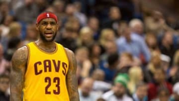 Jan 31, 2015; Minneapolis, MN, USA; Cleveland Cavaliers forward LeBron James (23) calls a play during the third quarter against the Minnesota Timberwolves at Target Center. The Cavaliers defeated the Timberwolves 106-90. Mandatory Credit: Brace Hemmelgarn-USA TODAY Sports