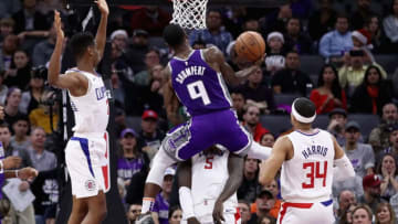 SACRAMENTO, CA - NOVEMBER 29: Iman Shumpert #9 of the Sacramento Kings goes up for a shot against Montrezl Harrell #5, Shai Gilgeous-Alexander #2, and Tobias Harris #34 of the LA Clippers at Golden 1 Center on November 29, 2018 in Sacramento, California. NOTE TO USER: User expressly acknowledges and agrees that, by downloading and or using this photograph, User is consenting to the terms and conditions of the Getty Images License Agreement. (Photo by Ezra Shaw/Getty Images)