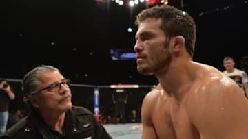 LAS VEGAS, NV - JULY 12: Jake Ellenberger is inspected by a cutman after losing to Stephen Thompson in their welterweight bout during the Ultimate Fighter Finale inside MGM Grand Garden Arena on July 12, 2015 in Las Vegas, Nevada. (Photo by Brandon Magnus/Zuffa LLC/Zuffa LLC via Getty Images)