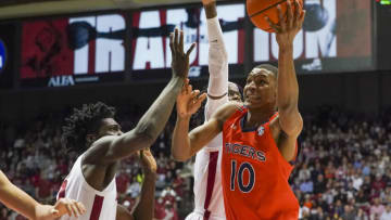 Auburn basketballJan 11, 2022; Tuscaloosa, Alabama, USA; Auburn Tigers forward Jabari Smith (10) shoots against the Alabama Crimson Tide during the first half at Coleman Coliseum. Mandatory Credit: Marvin Gentry-USA TODAY Sports