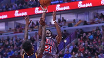 Dec 2, 2016; Chicago, IL, USA; Chicago Bulls forward Jimmy Butler (21) shoots over Cleveland Cavaliers guard Iman Shumpert (4) during the second quarter at the United Center. Mandatory Credit: Dennis Wierzbicki-USA TODAY Sports