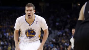 Mar 22, 2014; Oakland, CA, USA; Golden State Warriors forward David Lee (10) shouts at a referee during action against the San Antonio Spurs in the first quarter at Oracle Arena. Mandatory Credit: Cary Edmondson-USA TODAY Sports