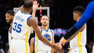 CLEVELAND, OH - DECEMBER 5: Kevin Durant #35 celebrates with Stephen Curry #30 of the Golden State Warriors during the second half against the Cleveland Cavaliers at Quicken Loans Arena on December 5, 2018 in Cleveland, Ohio. The Warriors defeated the Cavaliers 129-105. NOTE TO USER: User expressly acknowledges and agrees that, by downloading and/or using this photograph, user is consenting to the terms and conditions of the Getty Images License Agreement. (Photo by Jason Miller/Getty Images)