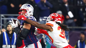FOXBOROUGH, MA - OCTOBER 14: Rob Gronkowski #87 of the New England Patriots makes a catch while under pressure from Josh Shaw #30 of the Kansas City Chiefs in the fourth quarter of a game at Gillette Stadium on October 14, 2018 in Foxborough, Massachusetts. (Photo by Adam Glanzman/Getty Images)