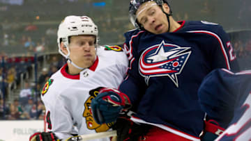 COLUMBUS, OH - SEPTEMBER 18: Henrik Samuelsson (54) of the Chicago Blackhawks checks Zac Dalpe (29) of the Columbus Blue Jackets in the third period of a game between the Columbus Blue Jackets and the Chicago Blackhawks on September 18, 2018 at Nationwide Arena in Columbus, OH. The Blue Jackets won 4-1. (Photo by Adam Lacy/Icon Sportswire via Getty Images)