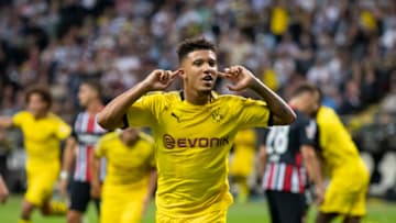 FRANKFURT AM MAIN, GERMANY - SEPTEMBER 22: Jadon Sancho of Borussia Dortmund celebrates after scoring his team's second goal during the Bundesliga match between Eintracht Frankfurt and Borussia Dortmund at Commerzbank-Arena on September 22, 2019 in Frankfurt am Main, Germany. (Photo by TF-Images/Getty Images)