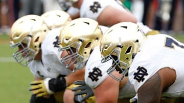 Sep 12, 2015; Charlottesville, VA, USA; The Notre Dame Fighting Irish offensive line lines up against the Virginia Cavaliers at Scott Stadium. Mandatory Credit: Geoff Burke-USA TODAY Sports