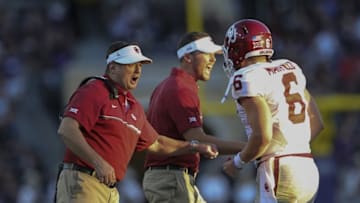 Oct 1, 2016; Fort Worth, TX, USA; Oklahoma Sooners head coach Bob Stoops and quarterback Baker Mayfield (6) and offensive coordinator Lincoln Riley celebrate during the game against the TCU Horned Frogs at Amon G. Carter Stadium. Mandatory Credit: Kevin Jairaj-USA TODAY Sports