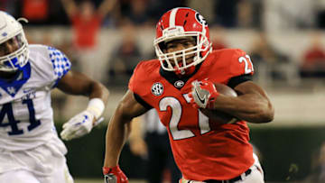 ATHENS, GA - NOVEMBER 18: Nick Chubb No. 27 of the Georgia Bulldogs runs for a touchdown during the second half against the Kentucky Wildcats at Sanford Stadium on November 18, 2017 in Athens, Georgia. (Photo by Daniel Shirey/Getty Images)