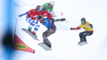 MONTAFON, AUSTRIA - DECEMBER 16: Michela Moioli of Italy takes 1st place, Lara Casanova competes, Lindsey Jacobellis of USA competes, Carle Brenneman of Canada competes during the FIS Freestyle Ski World Cup, Men's and Women's Ski Snowboardcross on December 16, 2017 in Montafon, Austria. (Photo by Laurent Salino/Agence Zoom/Getty Images)