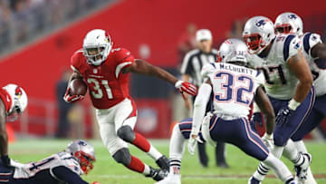 Sep 11, 2016; Glendale, AZ, USA; Arizona Cardinals running back David Johnson (31) runs the ball in the second quarter against the New England Patriots at University of Phoenix Stadium. Mandatory Credit: Mark J. Rebilas-USA TODAY Sports