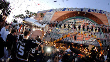 The Ducks Ryan Getzlaf walks with the Stanley Cup down the red carpet in front of fans and the media during the Anaheim Ducks Stanley Cup rally and celebration at the Honda Center. (Photo by John Cordes/Icon SMI/Icon Sport Media via Getty Images)