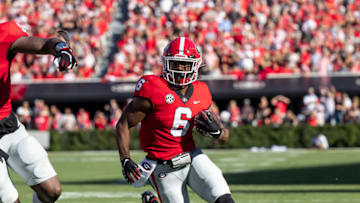 ATHENS, GA - OCTOBER 8: Kenny McIntosh #6 of the Georgia Bulldogs runs with the ball during a game between Auburn Tigers and Georgia Bulldogs at Sanford Stadium on October 8, 2022 in Athens, Georgia. (Photo by Steve Limentani/ISI Photos/Getty Images)
