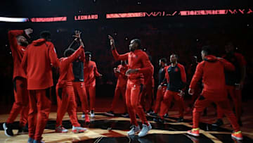 TORONTO, ON - OCTOBER 17: Kawhi Leonard #2 (C) of the Toronto Raptors is introduced to the crowd prior to the first half of the NBA season opener against the Cleveland Cavaliers at Scotiabank Arena on October 17, 2018 in Toronto, Canada. NOTE TO USER: User expressly acknowledges and agrees that, by downloading and or using this photograph, User is consenting to the terms and conditions of the Getty Images License Agreement. (Photo by Vaughn Ridley/Getty Images)