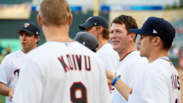 MINNEAPOLIS, MINNESOTA - SEPTEMBER 10: Ryan Suter #20 of the Minnesota Wild speaks to teammates before delivering a ceremonial pitch before the interleague game between the Minnesota Twins and the Washington Nationals at Target Field on September 10, 2019 in Minneapolis, Minnesota. The Twins defeated the Nationals 5-0. (Photo by Hannah Foslien/Getty Images)