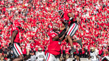 ATHENS, GA - NOVEMBER 20: Kenny McIntosh #6 and Justin Shaffer #54 celebrate a touchdown during a game between Charleston Southern Buccaneers and Georgia Bulldogs at Sanford Stadium on November 20, 2021 in Athens, Georgia. (Photo by Steven Limentani/ISI Photos/Getty Images)