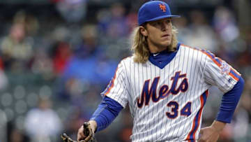 May 1, 2016; New York City, NY, USA; New York Mets starting pitcher Noah Syndergaard (34) walks to the dugout against the San Francisco Giants during the fourth inning at Citi Field. Mandatory Credit: Adam Hunger-USA TODAY Sports
