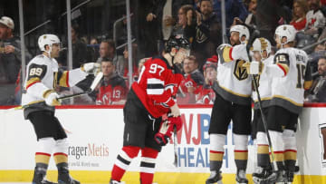 NEWARK, NJ - DECEMBER 3: Jonathan Marchessault #81 of the Vegas Golden Knights celebrates scoring his second goal of the third period as Nikita Gusev #97 of the New Jersey Devils skates away during the game at the Prudential Center on December 3, 2019 in Newark, New Jersey.The Knights defeated the Devils 4-3. (Photo by Andy Marlin/NHLI via Getty Images)