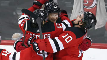 Nico Hischier #13, Pavel Zacha #37 and Alexander Holtz #10 of the New Jersey Devils (Photo by Bruce Bennett/Getty Images)