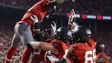 Nov 5, 2016; Columbus, OH, USA; Ohio State Buckeyes offensive lineman Michael Jordan (73) throws running back Curtis Samuel (4) into the air after his touchdown against the Nebraska Cornhuskers in the second quarter at Ohio Stadium. Mandatory Credit: Greg Bartram-USA TODAY Sports