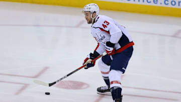 Feb 28, 2021; Newark, New Jersey, USA; Washington Capitals right wing Tom Wilson (43) looks to pass the puck during the second period against the New Jersey Devils at Prudential Center. Mandatory Credit: Vincent Carchietta-USA TODAY Sports