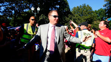OXFORD, MS - OCTOBER 29: Mississippi Rebels head coach Hugh Freeze greets fans as they walk down the Walk of Champions in the Grove before an NCAA college football game against the Auburn Tigers on October 29, 2016 in Oxford, Mississippi. (Photo by Butch Dill/Getty Images)
