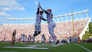 Sep 17, 2016; Blacksburg, VA, USA; Virginia Tech Hokies tight end Chris Cunningham (85) celebrates with wide receiver Cam Phillips (5) after scoring a touchdown against the Boston College Eagles during the third quarter at Lane Stadium. Mandatory Credit: Peter Casey-USA TODAY Sports