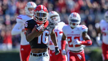 Nov 19, 2016; Athens, GA, USA; Georgia Bulldogs wide receiver Isaiah McKenzie (16) returns a punt for a touchdown against the Louisiana-Lafayette Ragin Cajuns during the first quarter at Sanford Stadium. Mandatory Credit: Dale Zanine-USA TODAY Sports