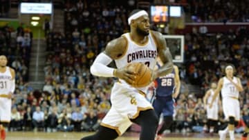 Dec 17, 2014; Cleveland, OH, USA; Cleveland Cavaliers forward LeBron James (23) drives against the Atlanta Hawks in the first quarter at Quicken Loans Arena. Mandatory Credit: David Richard-USA TODAY Sports