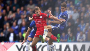LONDON, ENGLAND - OCTOBER 15: Marc Albrighton of Leicester City (C) battles for possession with Marcos Alonso of Chelsea (R) during the Premier League match between Chelsea and Leicester City at Stamford Bridge on October 15, 2016 in London, England. (Photo by Ian Walton/Getty Images)
