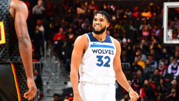 ATLANTA, GA - NOVEMBER 25: Karl-Anthony Towns #32 of the Minnesota Timberwolves smiles during a game against the Atlanta Hawks on November 25, 2019 at State Farm Arena in Atlanta, Georgia. NOTE TO USER: User expressly acknowledges and agrees that, by downloading and/or using this Photograph, user is consenting to the terms and conditions of the Getty Images License Agreement. Mandatory Copyright Notice: Copyright 2019 NBAE (Photo by Scott Cunningham/NBAE via Getty Images)
