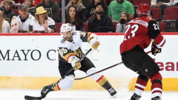 GLENDALE, AZ - NOVEMBER 21: Tomas Hyka #38 of the Vegas Golden Knights skates with the puck as Oliver Ekman-Larsson #23 of the Arizona Coyotes defends during the first period at Gila River Arena on November 21, 2018 in Glendale, Arizona. (Photo by Norm Hall/NHLI via Getty Images)