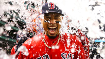 BOSTON, MA - JULY 26: Mookie Betts #50 of the Boston Red Sox is showered in Gatorade after the Boston Red Sox defeated the New York Yankees 10-5 at Fenway Park on July 26, 2019 in Boston, Massachusetts. (Photo by Adam Glanzman/Getty Images)