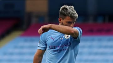 Manchester City's Argentinian striker Sergio Aguero reacts as he leaves the pitch, injured in a challenge with Burnley's English defender Ben Mee (not pictured) during the English Premier League football match between Manchester City and Burnley at the Etihad Stadium in Manchester, north west England, on June 22, 2020. (Photo by Martin Rickett / POOL / AFP) / RESTRICTED TO EDITORIAL USE. No use with unauthorized audio, video, data, fixture lists, club/league logos or 'live' services. Online in-match use limited to 120 images. An additional 40 images may be used in extra time. No video emulation. Social media in-match use limited to 120 images. An additional 40 images may be used in extra time. No use in betting publications, games or single club/league/player publications. / (Photo by MARTIN RICKETT/POOL/AFP via Getty Images)