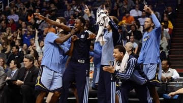 Jan 2, 2014; Phoenix, AZ, USA; Memphis Grizzlies bench reacts against the Phoenix Suns in the second half at US Airways Center. The Grizzlies won 99-91. Mandatory Credit: Jennifer Stewart-USA TODAY Sports