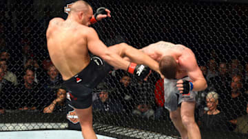DETROIT, MI - DECEMBER 02: (L-R) Eddie Alvarez kicks Justin Gaethje in their lightweight bout during the UFC 218 event inside Little Caesars Arena on December 02, 2017 in Detroit, Michigan. (Photo by Josh Hedges/Zuffa LLC/Zuffa LLC via Getty Images)