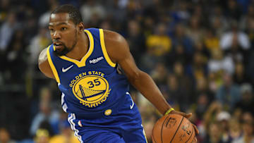 OAKLAND, CA - NOVEMBER 10: Kevin Durant #35 of the Golden State Warriors drives with the ball against the Brooklyn Nets during their NBA game at ORACLE Arena on November 10, 2018 in Oakland, California. NOTE TO USER: User expressly acknowledges and agrees that, by downloading and or using this photograph, User is consenting to the terms and conditions of the Getty Images License Agreement. (Photo by Robert Reiners/Getty Images)