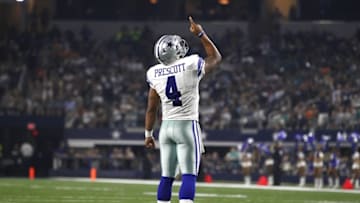 Aug 19, 2016; Arlington, TX, USA; Dallas Cowboys quarterback Dak Prescott (4) celebrates a touchdown in third quarter against the Miami Dolphins at AT&T Stadium. Dallas won 41-14. Mandatory Credit: Tim Heitman-USA TODAY Sports