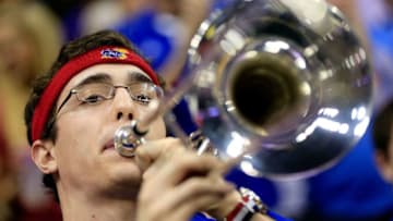 KANSAS CITY, MO - MARCH 16: A member of the Kansas Jayhawks band performs in the first half against the Kansas State Wildcats during the Final of the Big 12 basketball tournament at Sprint Center on March 16, 2013 in Kansas City, Missouri. (Photo by Jamie Squire/Getty Images)