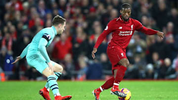 LIVERPOOL, ENGLAND - DECEMBER 29: Georginio Wijnaldum of Liverpool is closed down by Aaron Ramsey of Arsenal during the Premier League match between Liverpool FC and Arsenal FC at Anfield on December 29, 2018 in Liverpool, United Kingdom. (Photo by Clive Brunskill/Getty Images)